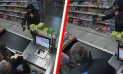 Hollanda’da Türk market sahibi silahlı soyguncuyu şişeyle kovaladı