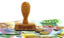 Almanya’da mahkemeden emsal karar: Yurt dışına çıkanın yardımı kesilemez